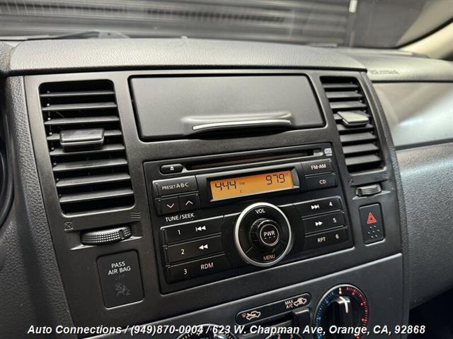 used 2009 Nissan Versa car, priced at $4,997