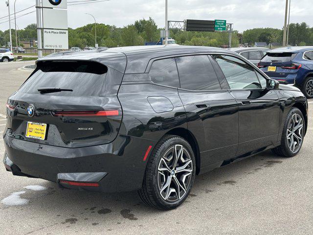 new 2026 BMW iX car, priced at $83,025