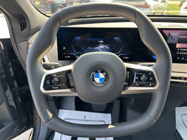 new 2026 BMW iX car, priced at $83,025