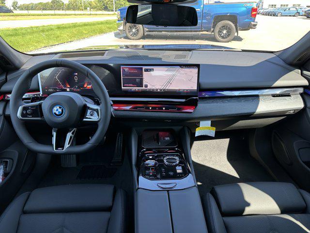 new 2026 BMW 550e car, priced at $84,790