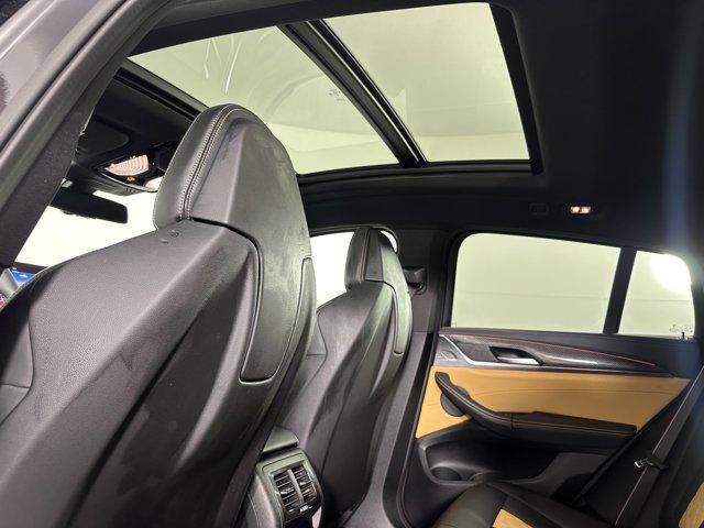 used 2023 BMW X4 M car, priced at $65,000