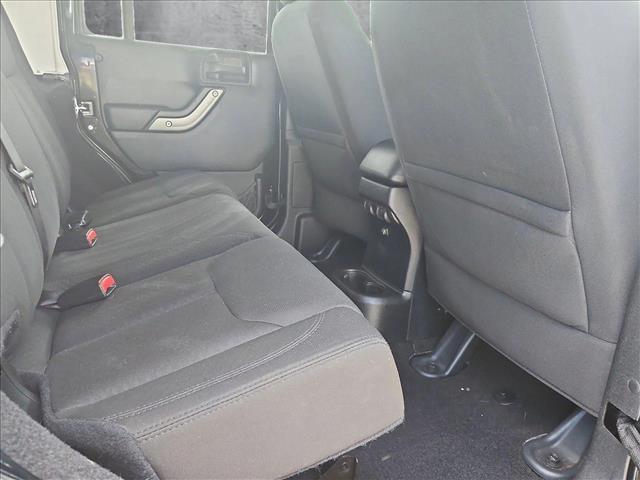 used 2016 Jeep Wrangler Unlimited car, priced at $15,504