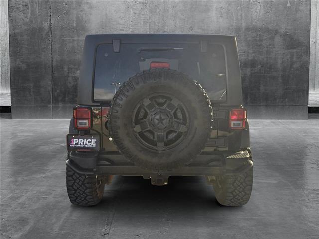 used 2012 Jeep Wrangler Unlimited car, priced at $17,953