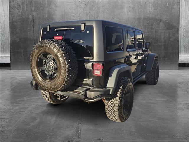 used 2012 Jeep Wrangler Unlimited car, priced at $17,953