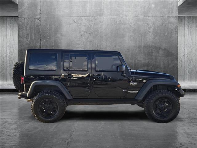 used 2012 Jeep Wrangler Unlimited car, priced at $17,953