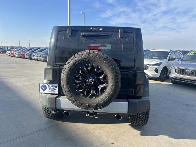 used 2014 Jeep Wrangler Unlimited car, priced at $17,313