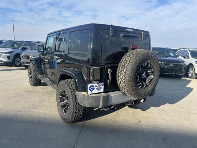 used 2014 Jeep Wrangler Unlimited car, priced at $17,313