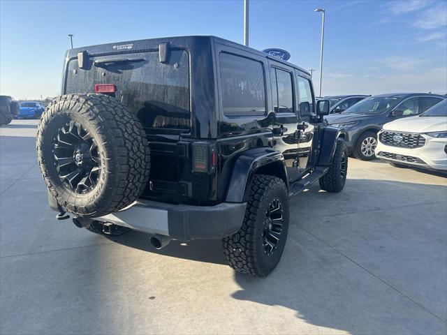 used 2014 Jeep Wrangler Unlimited car, priced at $17,313