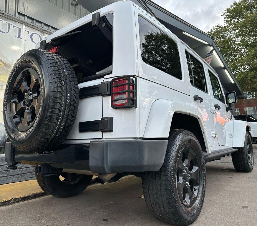 used 2015 Jeep Wrangler Unlimited car, priced at $13,500