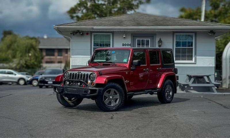 used 2012 Jeep Wrangler Unlimited car, priced at $15,995