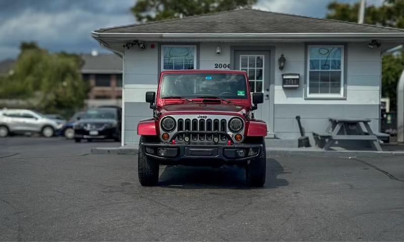 used 2012 Jeep Wrangler Unlimited car, priced at $15,495