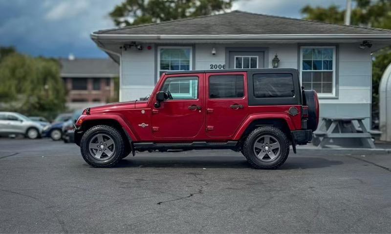 used 2012 Jeep Wrangler Unlimited car, priced at $15,495