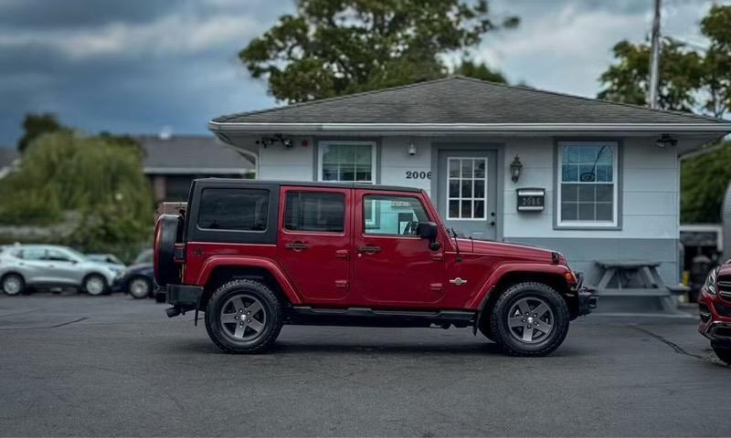 used 2012 Jeep Wrangler Unlimited car, priced at $15,495