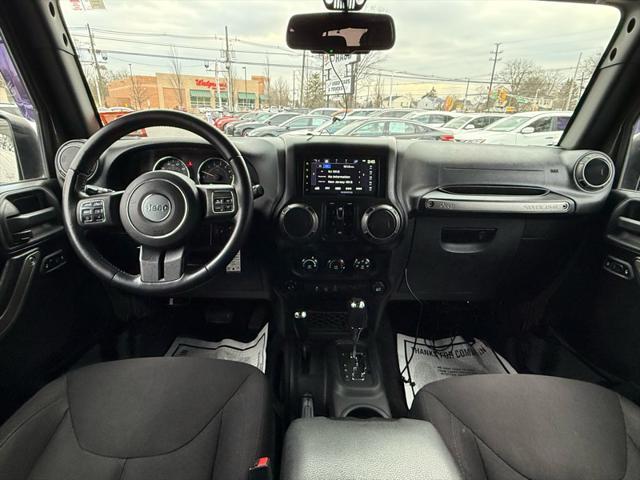 used 2015 Jeep Wrangler Unlimited car, priced at $16,495