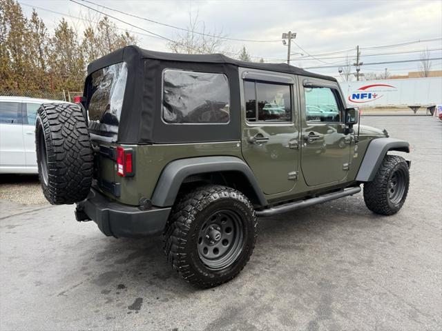 used 2015 Jeep Wrangler Unlimited car, priced at $16,495