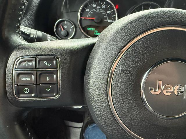 used 2015 Jeep Wrangler Unlimited car, priced at $16,495