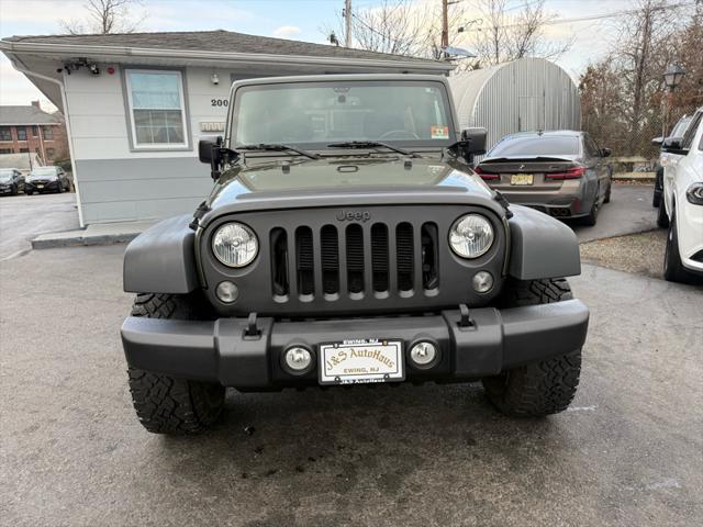 used 2015 Jeep Wrangler Unlimited car, priced at $16,495