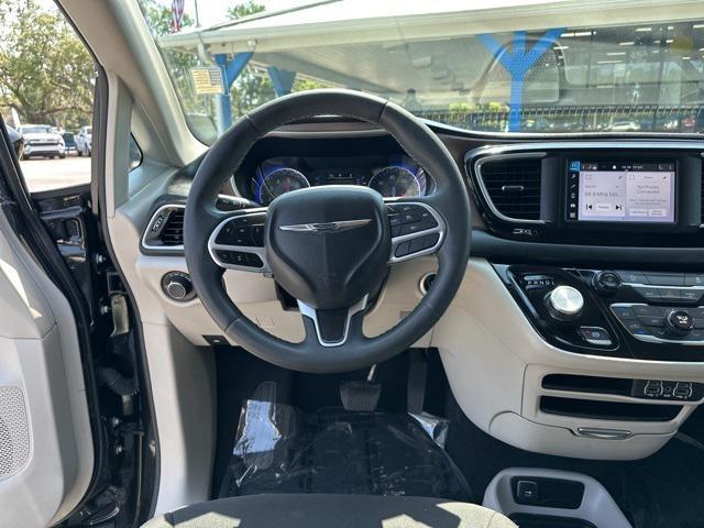 used 2023 Chrysler Voyager car, priced at $20,875
