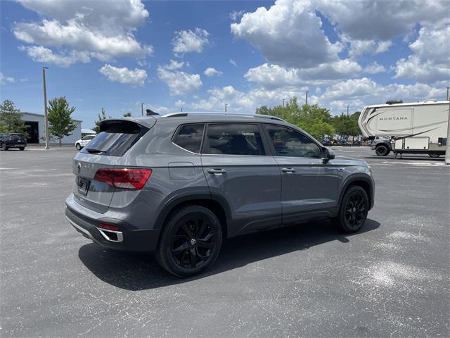 used 2023 Volkswagen Taos car, priced at $17,880