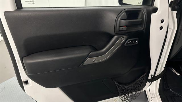 used 2014 Jeep Wrangler Unlimited car, priced at $13,776