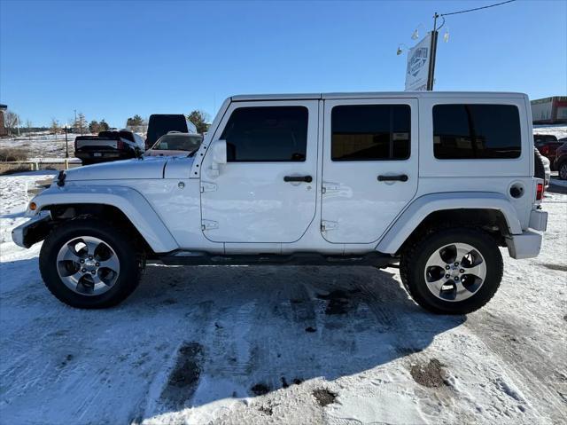 used 2011 Jeep Wrangler Unlimited car, priced at $10,988