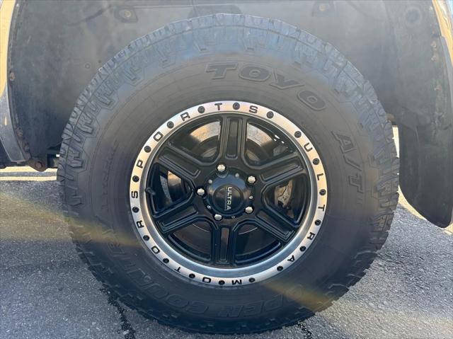 used 2014 Ram 1500 car, priced at $11,998