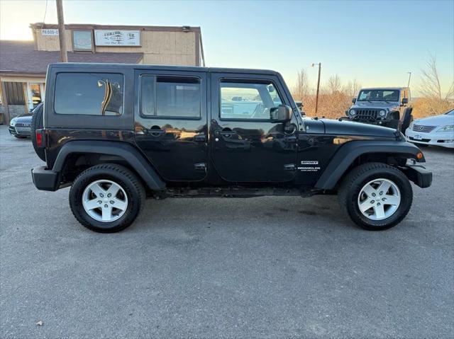 used 2015 Jeep Wrangler Unlimited car, priced at $16,388