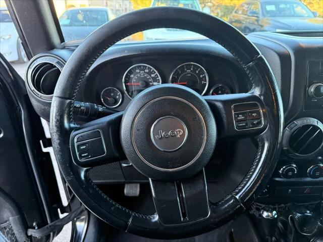 used 2015 Jeep Wrangler Unlimited car, priced at $16,388