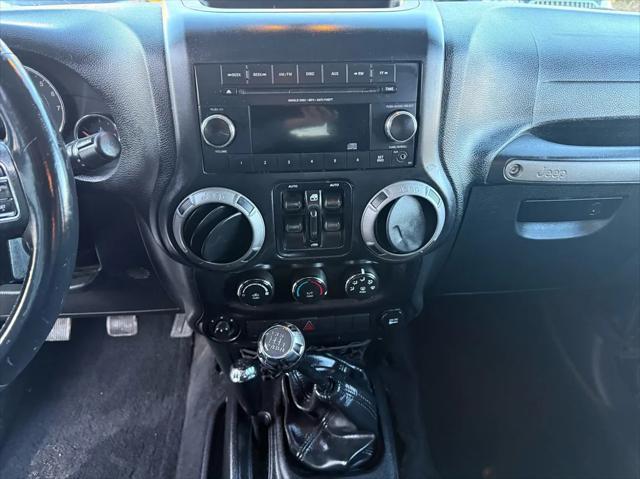 used 2015 Jeep Wrangler Unlimited car, priced at $16,388