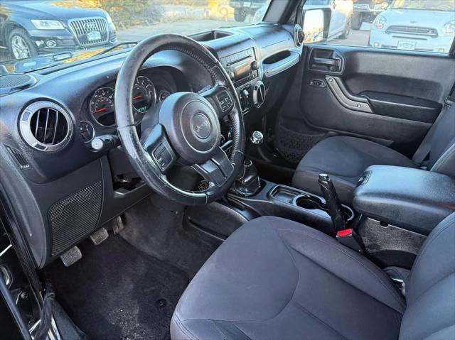 used 2015 Jeep Wrangler Unlimited car, priced at $16,388