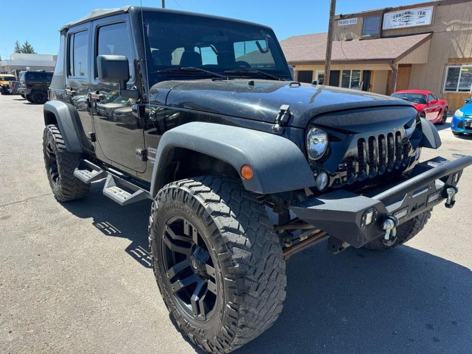 used 2014 Jeep Wrangler Unlimited car, priced at $14,988