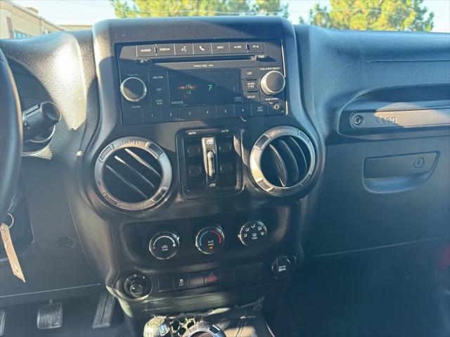 used 2011 Jeep Wrangler Unlimited car, priced at $14,988