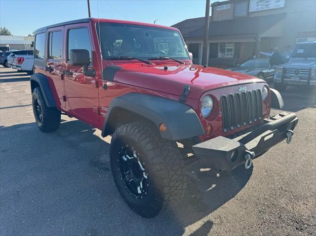 used 2011 Jeep Wrangler Unlimited car, priced at $14,988