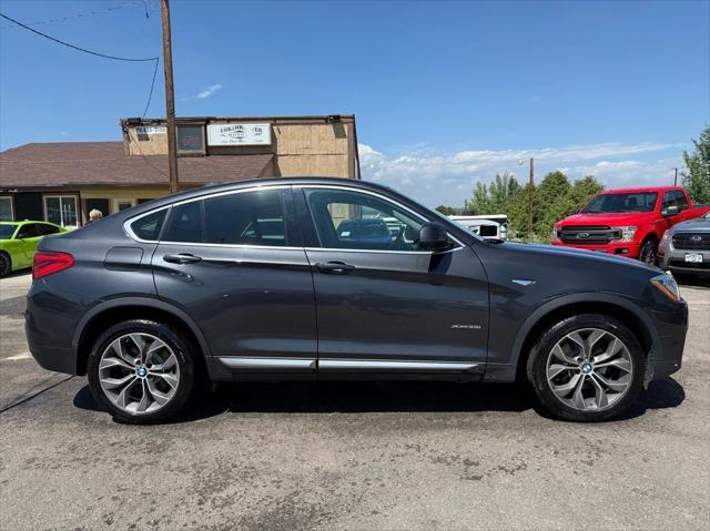 used 2015 BMW X4 car, priced at $16,998