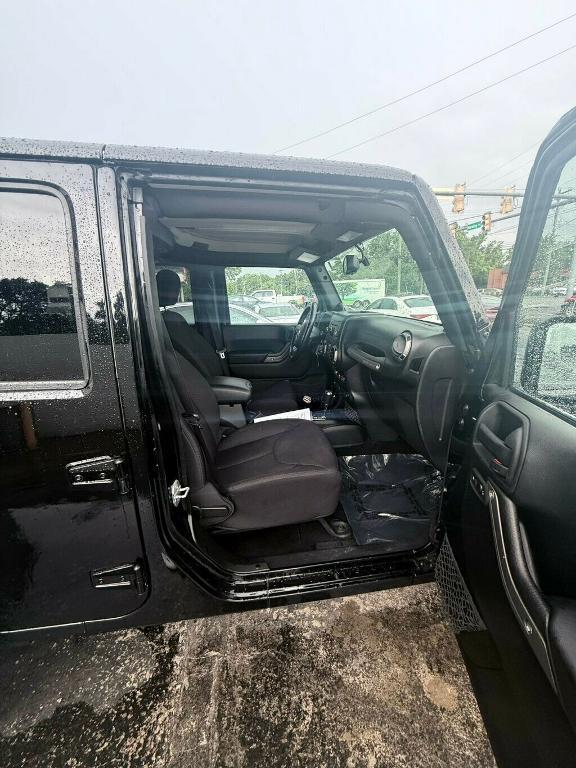 used 2014 Jeep Wrangler Unlimited car, priced at $17,881