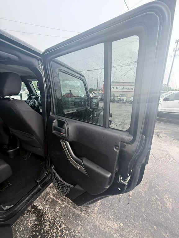 used 2014 Jeep Wrangler Unlimited car, priced at $17,881
