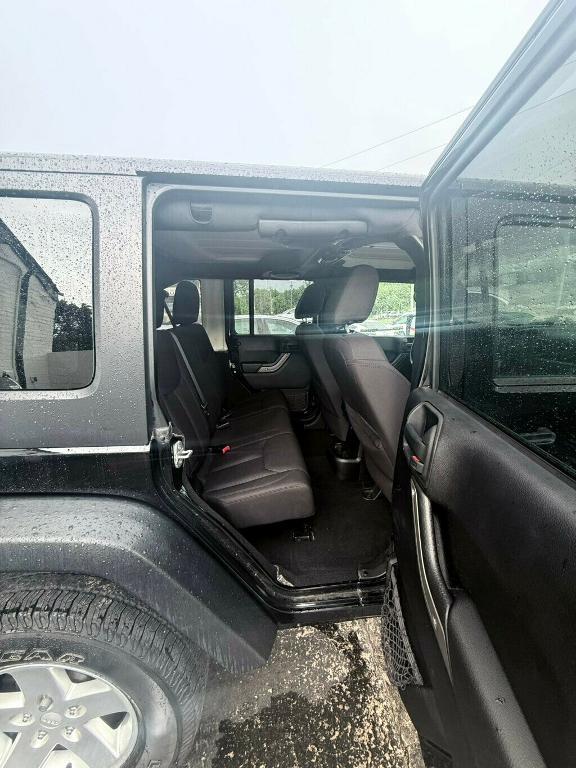 used 2014 Jeep Wrangler Unlimited car, priced at $17,881