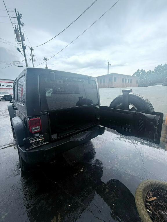 used 2014 Jeep Wrangler Unlimited car, priced at $17,881