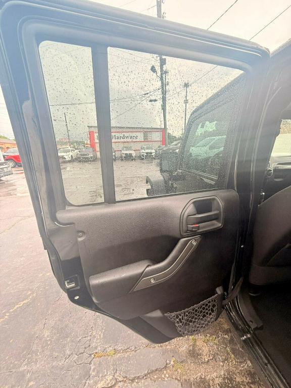 used 2014 Jeep Wrangler Unlimited car, priced at $17,881