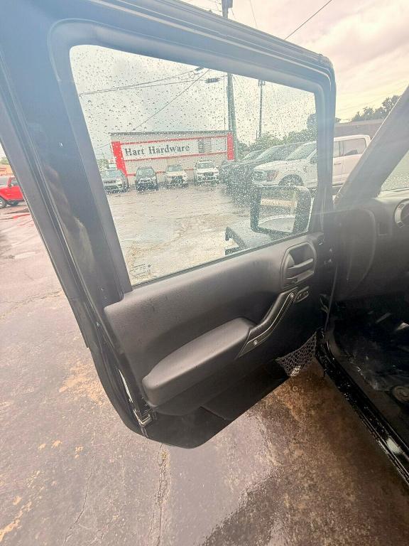 used 2014 Jeep Wrangler Unlimited car, priced at $17,881
