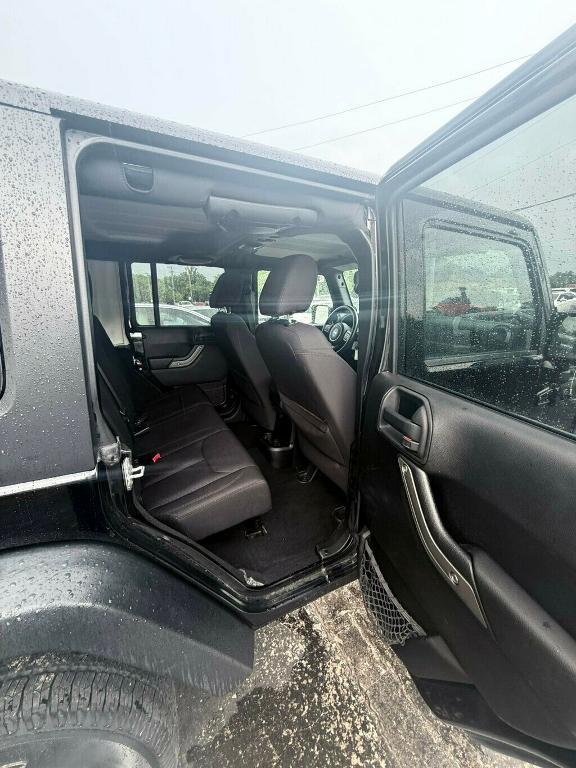 used 2014 Jeep Wrangler Unlimited car, priced at $17,881