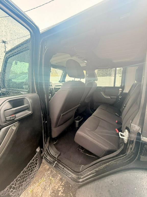 used 2014 Jeep Wrangler Unlimited car, priced at $17,881