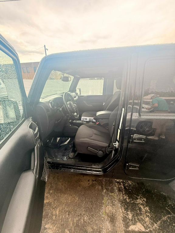 used 2014 Jeep Wrangler Unlimited car, priced at $17,881