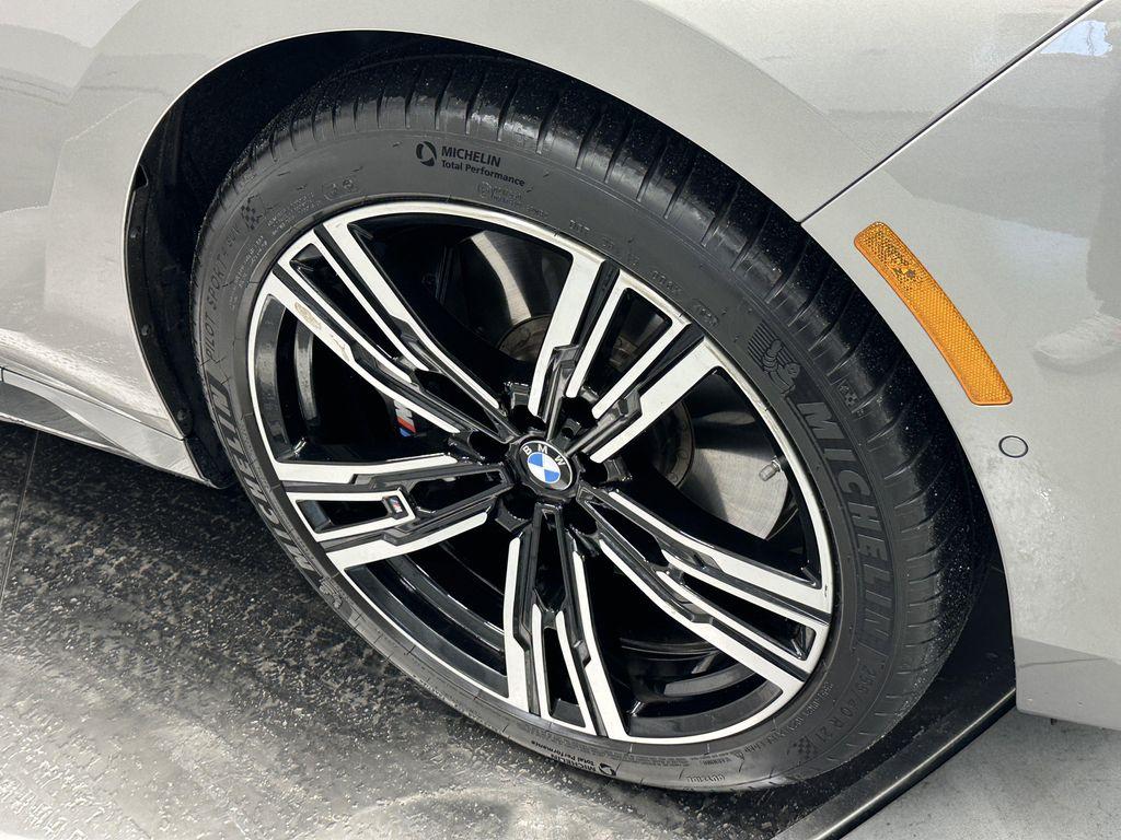 used 2024 BMW 740 car, priced at $71,910