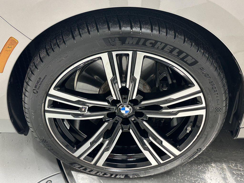 used 2024 BMW 740 car, priced at $71,910