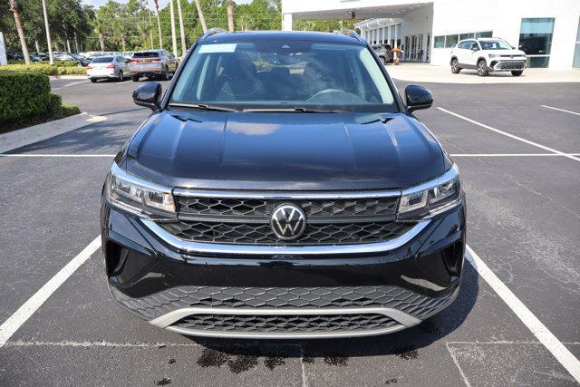 used 2023 Volkswagen Taos car, priced at $18,995