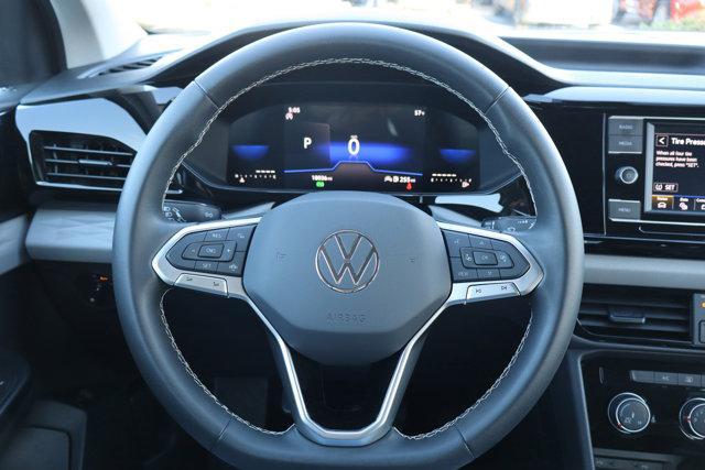 used 2023 Volkswagen Taos car, priced at $18,495