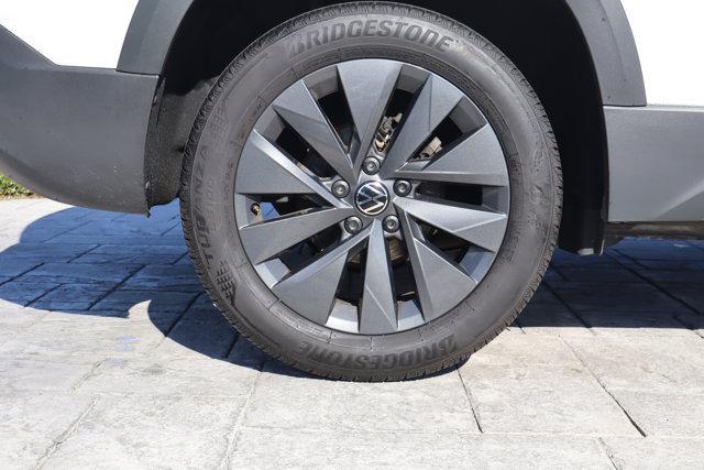 used 2023 Volkswagen Taos car, priced at $19,086