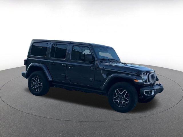 used 2025 Jeep Wrangler car, priced at $40,130