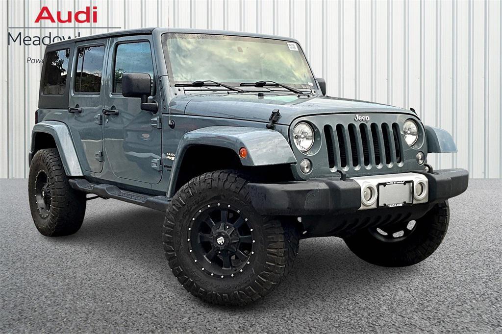 used 2014 Jeep Wrangler Unlimited car, priced at $17,488
